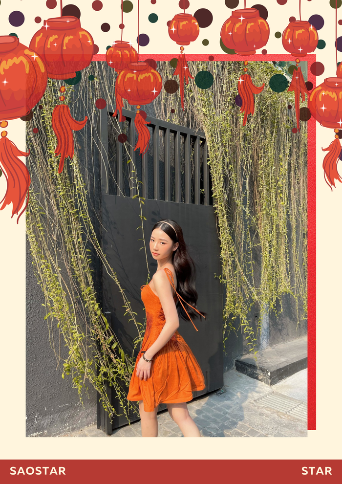 Amee khoe trọn sự trẻ trung trong chiếc váy màu cam.