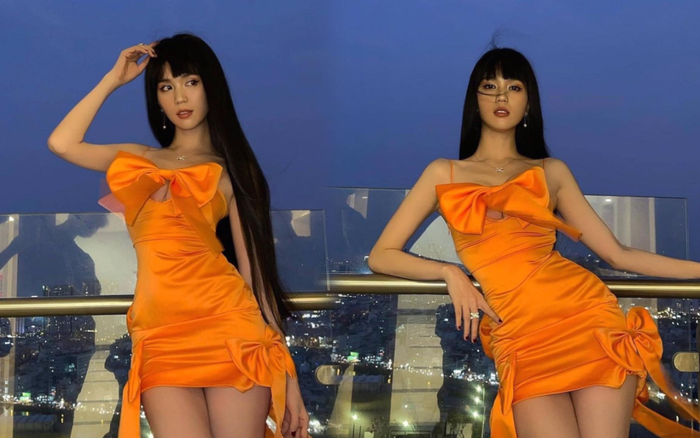 Ngọc Trinh để tóc mái ấn tượng diện váy cam phơi phới đi chơi Valentine Ảnh 2
