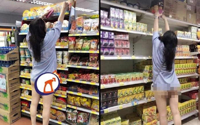 Thản nhiên nhón chân lấy gói mì trên kệ, cô gái lộ nguyên vòng 3 khiến người xung quanh 'đỏ mặt' Ảnh 2