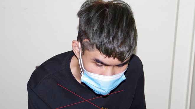 Trần Mạnh Hùng tại cơ quan công an.