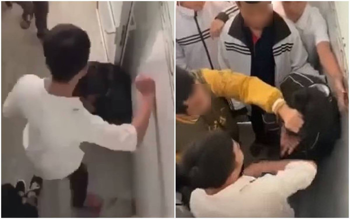 Một học sinh nam bị nhóm bạn quây đánh hội đồng trong nhà vệ sinh. Ảnh cắt từ clip