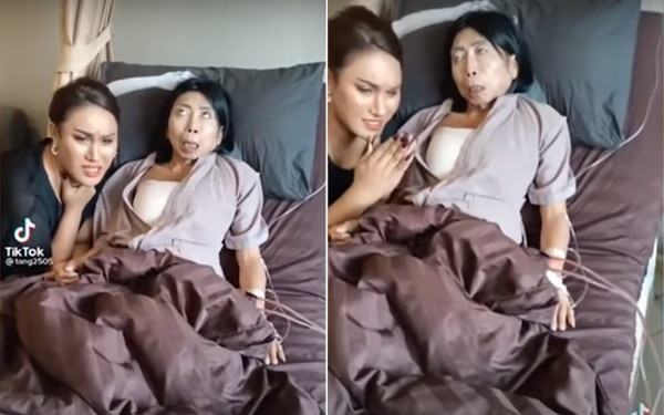 Sitan Buathong với hình ảnh mắt trợn ngược, tay đầy ống truyền kim.