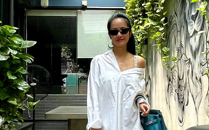 Diva Hồng Nhung 'cưa sừng làm nghé' với style giấu quần, khoe đôi chân nuột không cần photoshop Ảnh 2