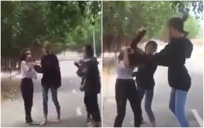 Nữ sinh N.T.T (mặc áo trắng) bị đánh hội đồng. Ảnh cắt từ clip