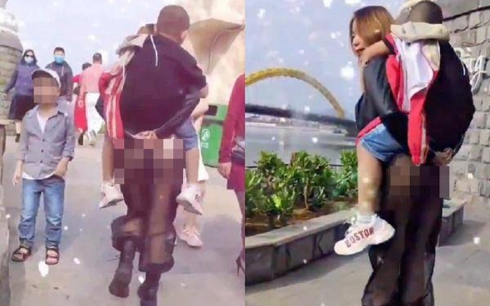 Cõng con trai rong chơi trong chiếc quần lộ rõ vòng 3, chị gái nghiện thả rông lại gây bão mạng xã hội Ảnh 2