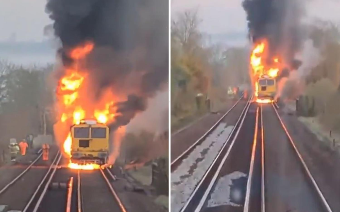 Tàu hoả bốc cháy dữ dội trên đường ray, cột khói đen cao ngút Ảnh 2