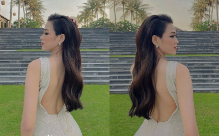 Đỗ Thị Hà diện đầm siêu cắt khoét, ưỡn người tạo dáng đến mức than 'mỏi lưng' Ảnh 2