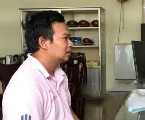 Đối tượng Trương Kiến Minh tại cơ quan công an. Ảnh: Báo Người Lao Động