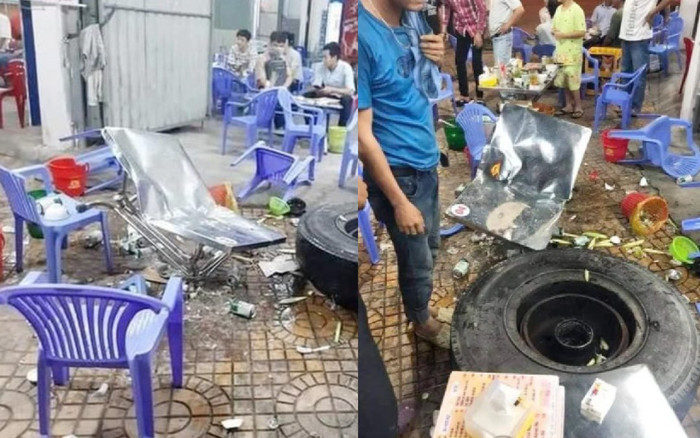 Đang ngồi ăn uống trên vỉa hè, thực khách bỏ chạy tán loạn vì bị lốp ô tô văng trúng Ảnh 2