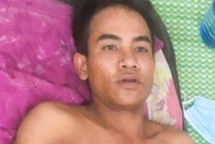 Bị can Hồ Văn Dên tại bệnh viện. Ảnh: Báo Lao Động