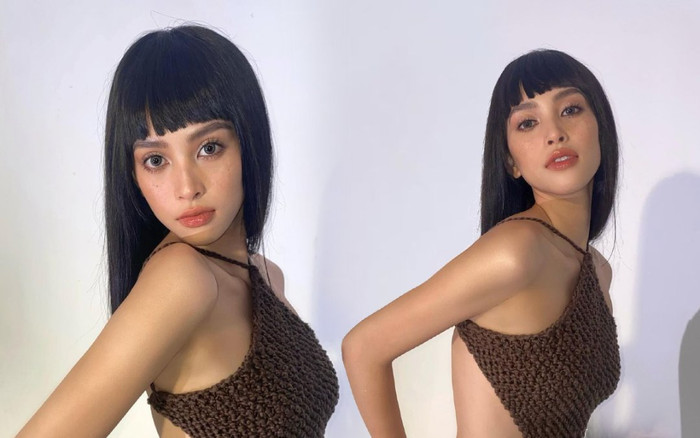 Tiểu Vy để tóc mái ngố lạ lẫm, diện áo yếm khoe body mảnh mai khiến Mai Phương Thúy phải trầm trồ Ảnh 2