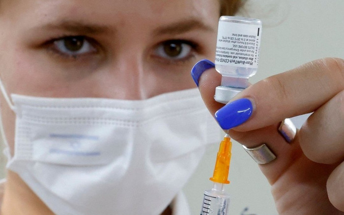 Đây là quốc gia đầu tiên trên thế giới tăng 3 mũi tiêm vaccine Covid-19 Ảnh 2