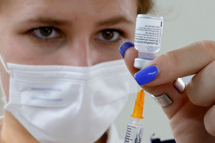 Đây là quốc gia đầu tiên trên thế giới tăng 3 mũi tiêm vaccine Covid-19 Ảnh 1