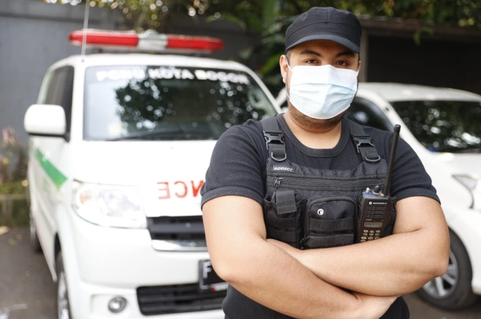 Tinh nguyện viên Muhammad Jauhar.