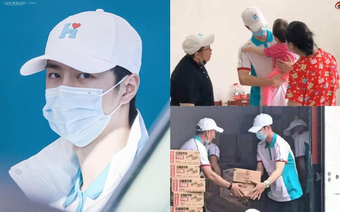 Vương Nhất Bác khiến fan 'lụi tim' với khoảnh khắc ẵm em nhỏ trong lúc đi Trịnh Châu cứu trợ Ảnh 2