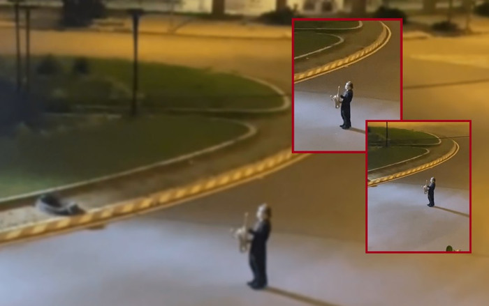 Xúc động hình ảnh người đàn ông trình diễn saxophone trong bệnh viện dã chiến! Ảnh 2