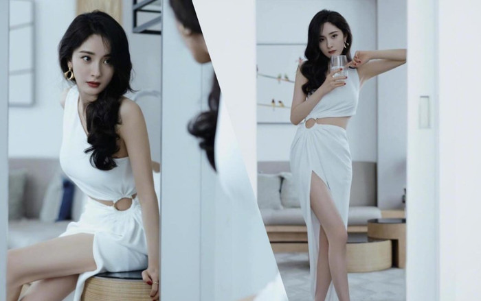 Dương Mịch khiến fan phát sốt khi khoe chân dài ngọc ngà trong chiếc váy trắng quyến rũ Ảnh 2