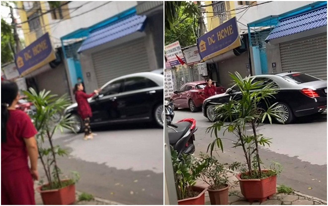 Người vợ chặn trước đầu ô tô, yêu cầu chồng và nhân tình xuống xe.