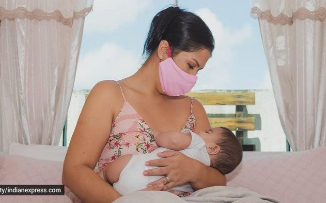 Cách cho con bú khi mẹ dương tính với COVID-19 Ảnh 2