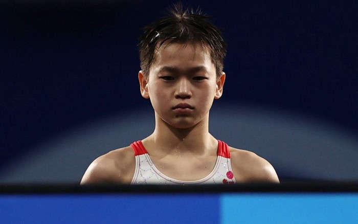 Nhà vô địch Olympic 14 tuổi và ước mơ kiếm tiền chữa bệnh cho mẹ Ảnh 2