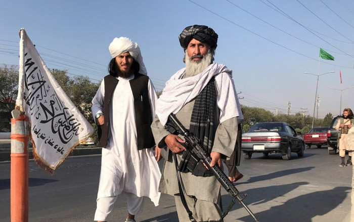 Taliban vác súng gõ cửa từng nhà giục người dân đi làm Ảnh 2
