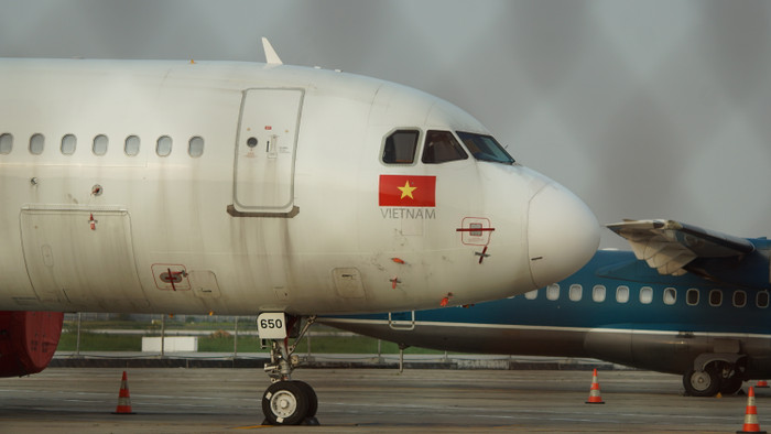 Ảnh: Hàng loạt máy bay 'nằm la liệt' tại sân bay Nội Bài do ảnh hưởng của dịch Covid-19 Ảnh 11