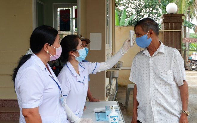 Người mắc COVID-19 không triệu chứng có lây lan bệnh không? Ảnh 2