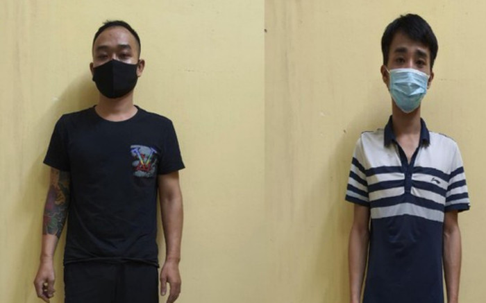 Tạm giữ hình sự 2 đối tượng 'thông chốt' kiểm dịch, kẹp cổ kéo lê lực lượng chức năng trên đường Ảnh 2