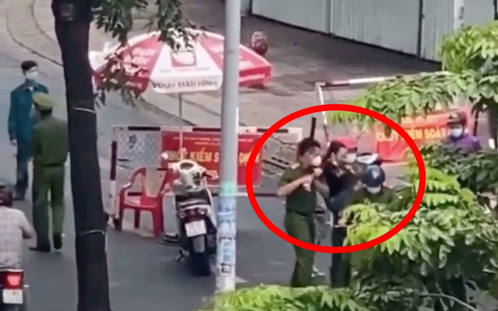 'Chị đại quận 4' lại tiếp tục gào thét chống đối khi bị 'bế' lên phường do vi phạm quy định phòng dịch Ảnh 2