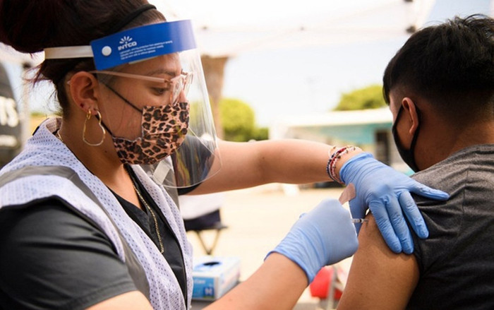 WHO: Không thể xóa sổ Covid-19 Ảnh 2