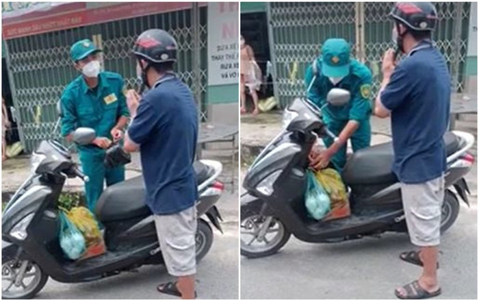 Người đàn ông liên tục chắp tay cảm ơn chiến sĩ dân quân tự vệ, nghe lời động viên khiến ai cũng xúc động Ảnh 2