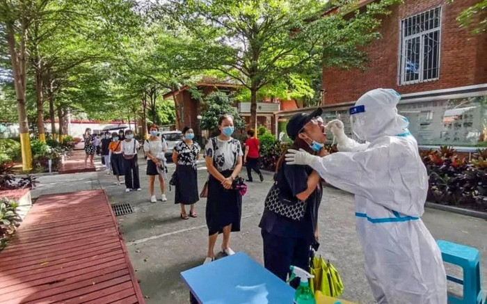 Trung Quốc bùng phát dịch Covid-19 từ ca mắc ủ bệnh 38 ngày, trải qua 9 lần xét nghiệm âm tính Ảnh 2