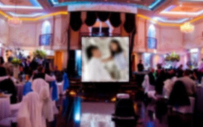 Phim 'mát mẻ' bị chiếu xen lẫn ảnh cô dâu chú rể tại đám cưới khiến khách mời 'ngượng chín mặt' Ảnh 2