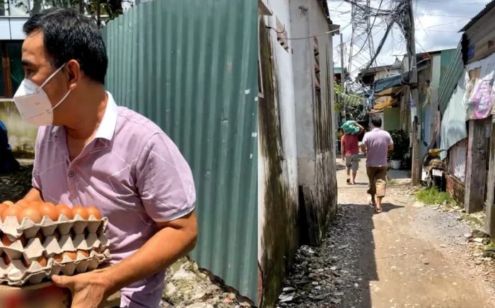 Nghệ sĩ Quyền Linh phát quà ở xóm ve chai, xúc động khi người dân hỏi tiền cứu trợ Ảnh 2