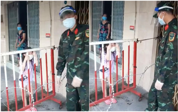Bé gái trong khu phong tỏa ôm rào khóc nức nở không ai dỗ được vì quá thần tượng chú bộ đội Ảnh 2