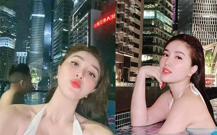 Bảo Thy khoe ảnh bơi đêm cực sang chảnh nhưng ông xã lấp ló phía sau mới 'chiếm spotlight' Ảnh 2