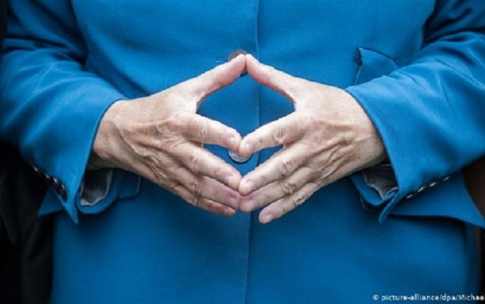 Cử chỉ tay nổi tiếng trở thành thương hiệu của bà Angela Merkel Ảnh 2