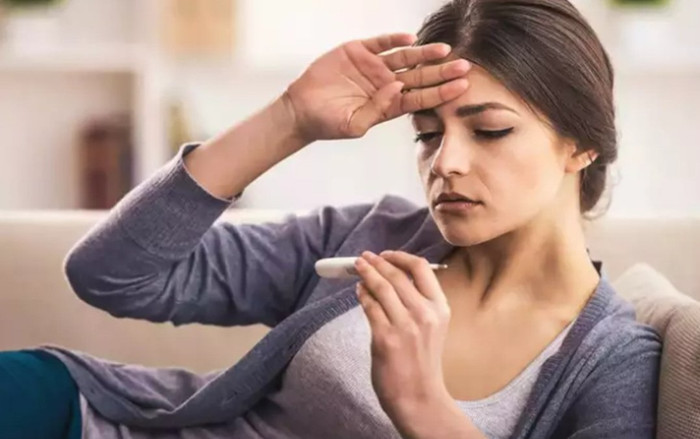 Làm thế nào để phân biệt giữa sốt xuất huyết và sốt do Covid-19? Ảnh 2