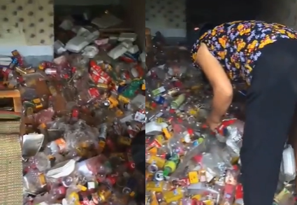 Chai nhựa, vỏ chai nước kín căn phòng. Ảnh cắt từ clip