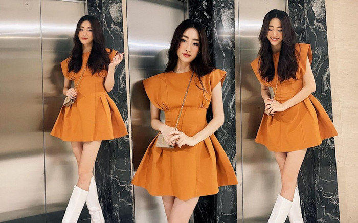 Lương Thùy Linh khoe triệt để đôi chân 1m22 khi mix váy ngắn và boots cổ cao Ảnh 2