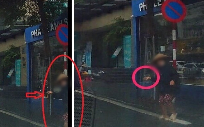 Thực hư về người phụ nữ 'bí ẩn' chuyên ném đá vào các xe ô tô chạy giữa phố Hà Nội Ảnh 2