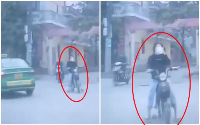 Cô gái đầu trần đi xe đạp điện 'ôm cua vèo vèo', ngửa cổ uống trà sữa rồi đâm vào ô tô Ảnh 2