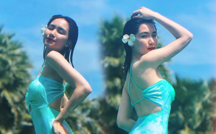 Hòa Minzy mặc đồ bơi cắt xẻ khoe sắc vóc chuẩn 'gái một con trông mòn con mắt' Ảnh 2