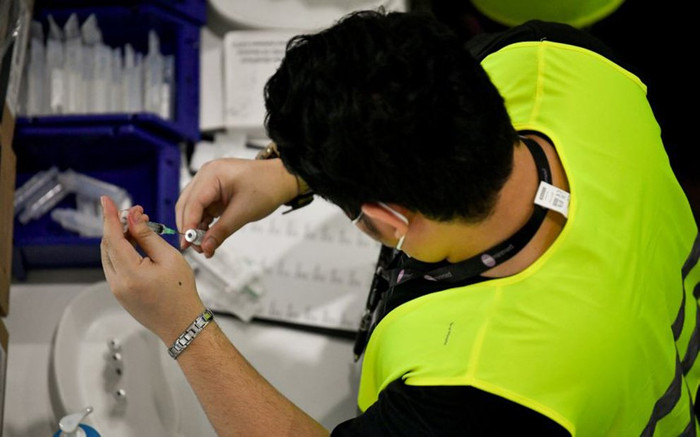 Singapore: Công chức sẽ phải nghỉ việc không lương nếu không tiêm vaccine Covid-19 Ảnh 2