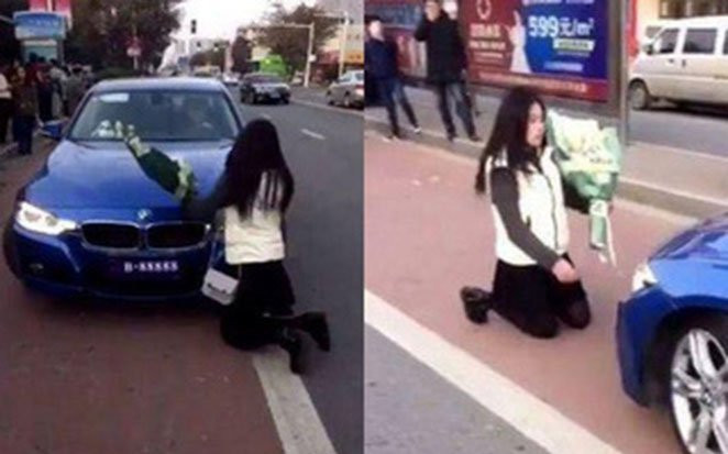Cô gái quỳ rạp tỏ tình với chàng trai trước đầu xe BMW, phản ứng của anh chàng gây bất ngờ Ảnh 2