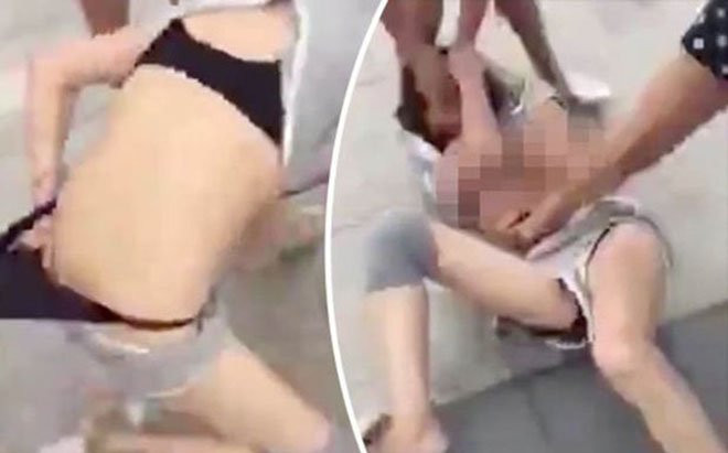 Bị nghi là 'tiểu tam', người phụ nữ bị 'chính cung' chặn đường lột đồ đánh ghen Ảnh 2