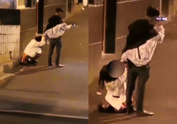 Cô gái quỳ xin bạn trai đừng nghe tin nhắn nữa ngay giữa đường.