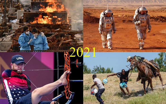 Năm 2021 sắp trôi qua, cùng nhìn lại những bức ảnh lột tả thế giới trong một năm đầy cảm xúc! Ảnh 2