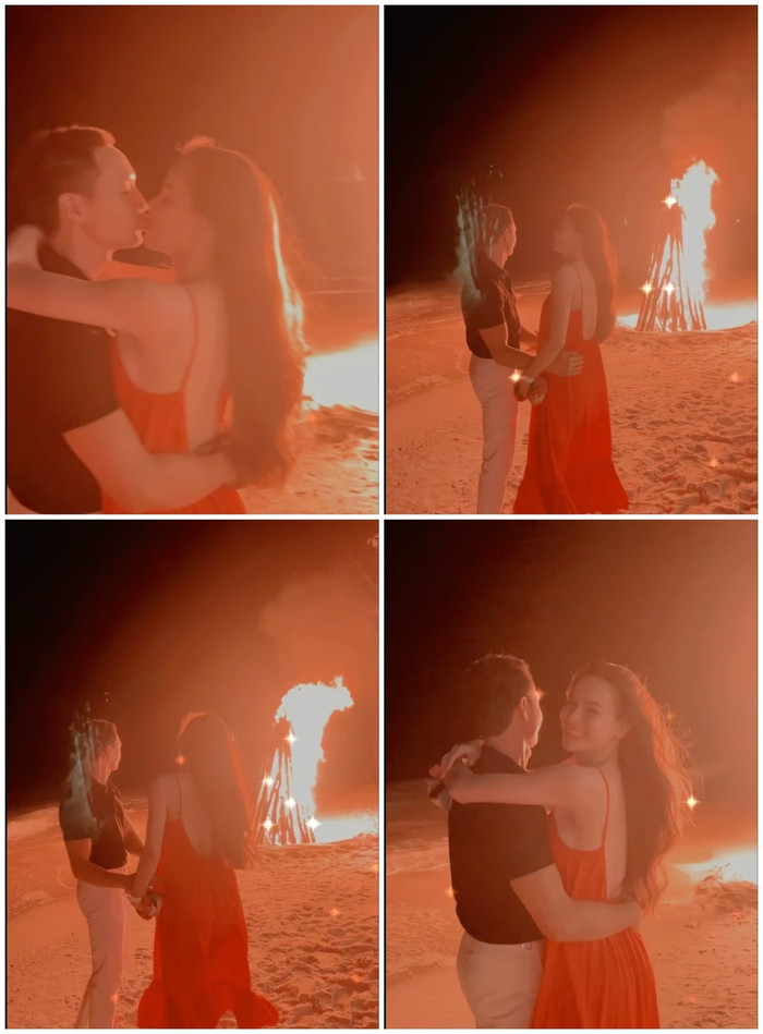 Cô hạnh phúc thể hiện tình cảm trên bãi biển với ánh lửa tượng trưng cho tình yêu nồng say.
