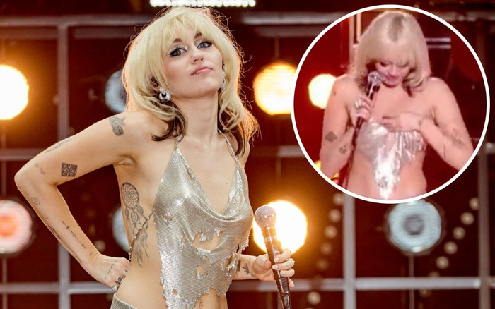 Gặp sự cố tuột áo hở trọn thân trên, Miley Cyrus vẫn bình tĩnh tiếp tục biểu diễn Ảnh 2